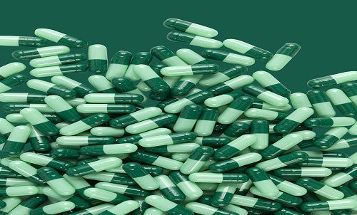 What is the use of the capsule on the outside of the capsule medicine?